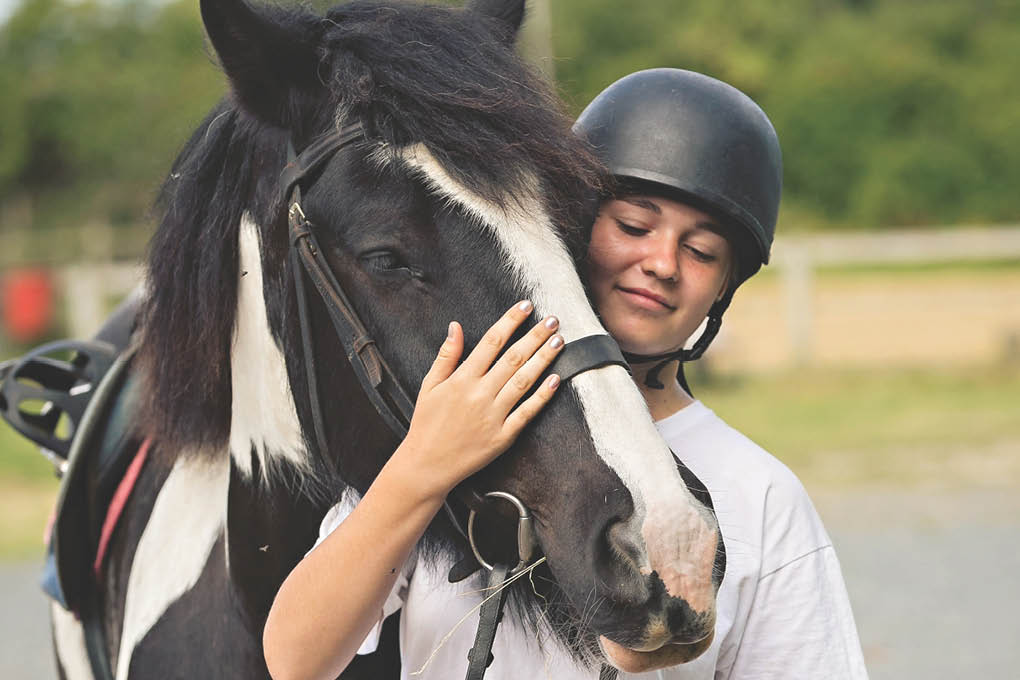 Horse Riding Smiling Girl