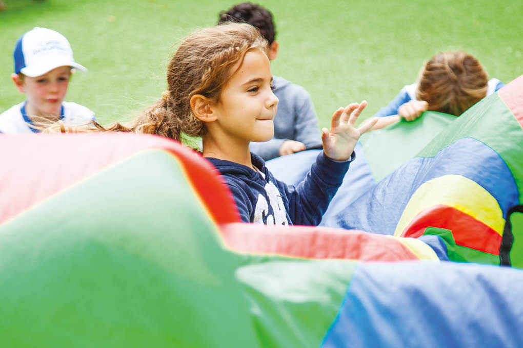 Parachute games girl smiling